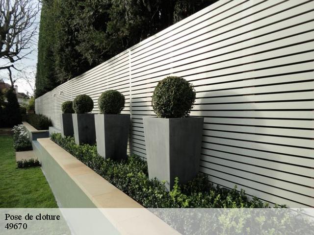 Pose de cloture 49670